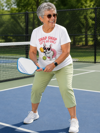 Load image into Gallery viewer, Woman wearing Snap Snap Let's Go Girl Frenchie pickleball graphic tee