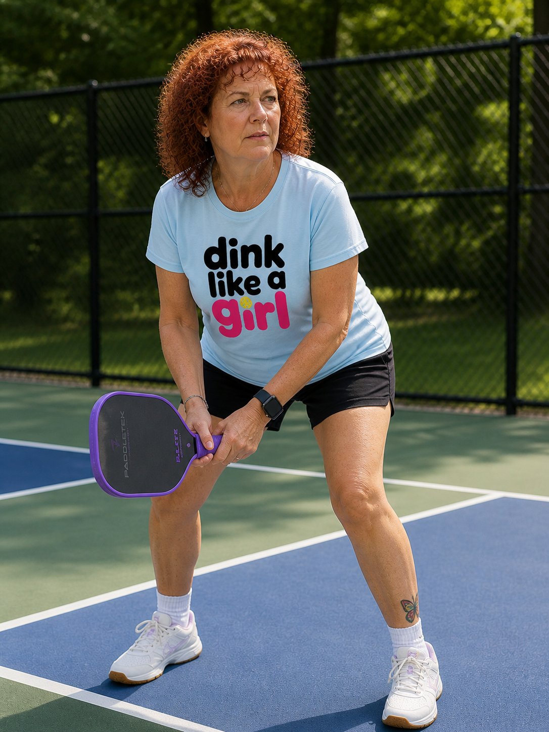Woman wearing Dink Like A Girl pickleball graphic tee