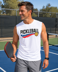 Load image into Gallery viewer, "Man wearing Mens Pickleball USA Streak performance muscle shirt with bold patriotic graphic"